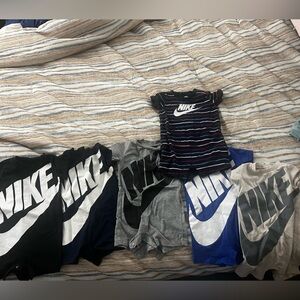 Nike Logo T-Shirts in Blue, Gray, and Black